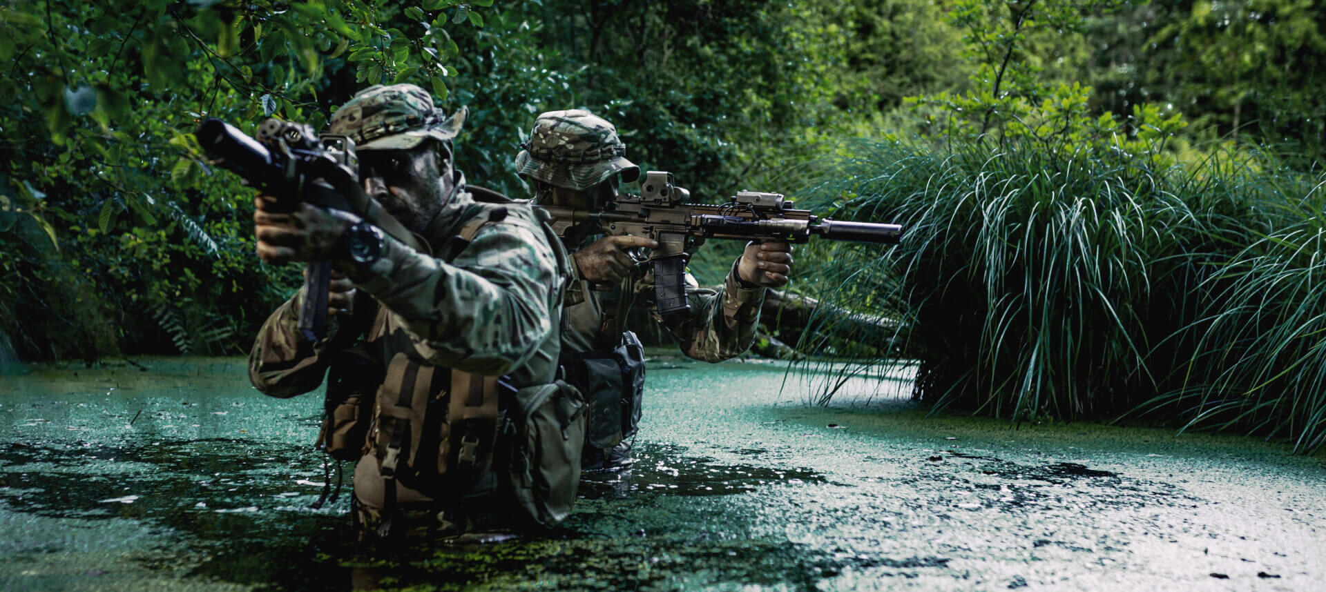 Close-up of a soldier’s camouflage, mimicking jungle textures and patterns for maximum concealment.